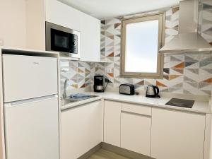 Kjøkken eller kjøkkenkrok på Apartamentos Cordial Magec Taurito