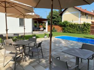 The swimming pool at or close to Best Apartman Lelle