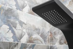 a close up of a black object in front of a wall at Meraviglia d'Otranto in Otranto