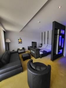 TV a/nebo společenská místnost v ubytování Apartments M Palace