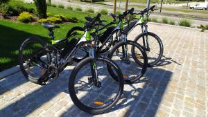 three bikes parked next to each other on a sidewalk at Casas Martainha in Sernancelhe
