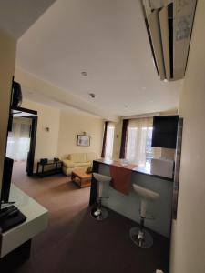 TV a/nebo společenská místnost v ubytování Apartments M Palace