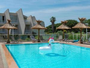 Bazén v ubytování Novotel La Grande Motte Golf nebo v jeho okolí
