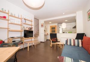 Televízia a/alebo spoločenská miestnosť v ubytovaní Blue sea apartment