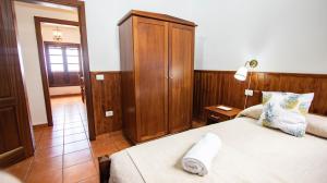 Cama o camas de una habitación en HolidaynorthTenerife Caserío Rural Los Charcos