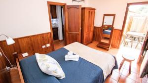 Cama o camas de una habitación en HolidaynorthTenerife Caserío Rural Los Charcos