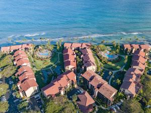 an aerial view of a resort next to the ocean at Papakea K406 OceanView 2 Bedroom 2 bath condo in Kahana