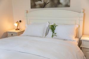 A bed or beds in a room at Villa Sotiris