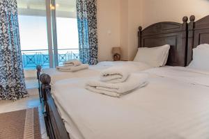 A bed or beds in a room at Villa Sotiris Még 32 kép