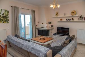 A television and/or entertainment centre at Villa Sotiris