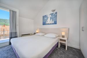Fotografia z galérie ubytovania Hotel Aqua - Guest Rooms & Suites Kaštela v destinácii Kaštela + 20 fotografií