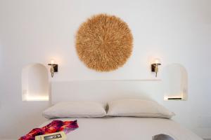 Cama ou camas em um quarto em Punta Di Diamante