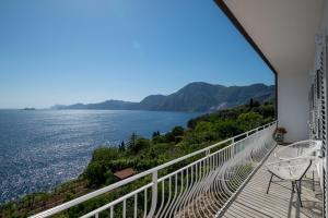 a balcony with a view of the water at Casa Clara in Praiano