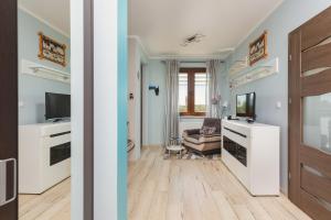 Kuchyňa alebo kuchynka v ubytovaní Apartment Na Zakolu Wisły by Noclegi Renters