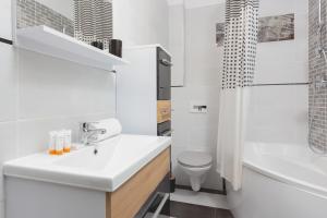 Kúpeľňa v ubytovaní Apartment Na Zakolu Wisły by Noclegi Renters