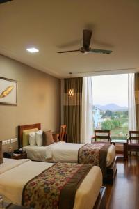 Postel nebo postele na pokoji v ubytování Brahma Horizon Hotel & Spa - Pushkar + 37 fotografií