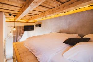 Postel nebo postele na pokoji v ubytování Penzion Castello + 37 fotografií