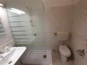 A bathroom at Casa Santa Maria - Beautifully restored house in centro storico Irsina Basilicata Puglia