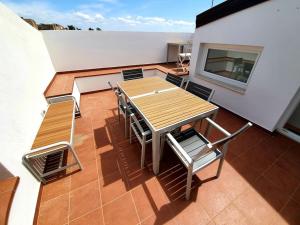A balcony or terrace at Casa Santa Maria - Beautifully restored house in centro storico Irsina Basilicata Puglia