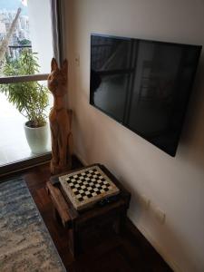 TV tai viihdekeskus majoituspaikassa Encanto da Lagoa