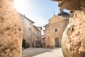 a view of a street in an old town at Asisium Boutique Hotel in Assisi