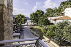a view of a street from a balcony at Atlantis Hotel in Skala Potamias