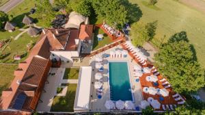 an overhead view of a house with a swimming pool at My Soul Resort in Knić