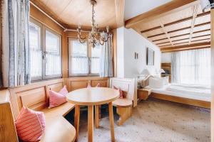 Postel nebo postele na pokoji v ubytování Hotel Garni Nuss