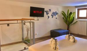 Posteľ alebo postele v izbe v ubytovaní STAZIONE BARI CENTRALE - Appartamento Moderno - Netflix & Amazon Prime Video