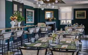 Ein Restaurant oder anderes Speiselokal in der Unterkunft Palazzo Rainis Hotel & Spa - Small Luxury Hotel - Adults Only 
