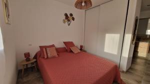 Posteľ alebo postele v izbe v ubytovaní Petite maison en pierre