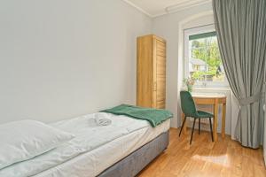 Posteľ alebo postele v izbe v ubytovaní Margo Bukowiec koło Karpacza