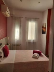 Łóżko lub łóżka w pokoju w obiekcie Hostal Inn Madrid