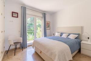Posteľ alebo postele v izbe v ubytovaní Penthouse Puerto Banus Sea View + 15 fotografií