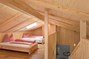 Postel nebo postele na pokoji v ubytování Ratscheinerhof App Waldruhe