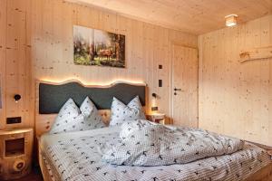 Postel nebo postele na pokoji v ubytování Ratscheinerhof App Waldruhe