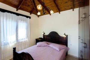 Postel nebo postele na pokoji v ubytování Villa Andreas