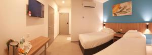 Ένα ή περισσότερα κρεβάτια σε δωμάτιο στο HOTEL ORKID PORT KLANG