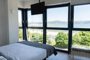 Postel nebo postele na pokoji v ubytování Mar de Sada