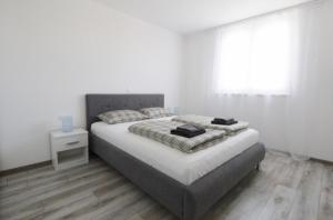Posteľ alebo postele v izbe v ubytovaní Apartments La Mar Zambratija