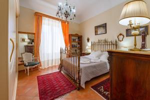 Posteľ alebo postele v izbe v ubytovaní La casa di Dante