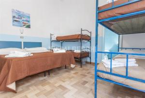 Postel nebo postele na pokoji v ubytování New Hotel Villa Enea + 37 fotografií