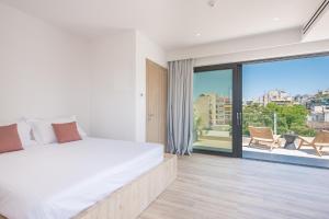 Posteľ alebo postele v izbe v ubytovaní Ceramian Athens
