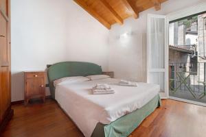 Säng eller sängar i ett rum på Casa Giada