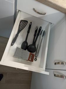 Kuchyň nebo kuchyňský kout v ubytování Apartment SEA HOLIDAYS