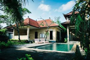 Bazén v ubytování Adil Villa & Resort nebo v jeho okolí