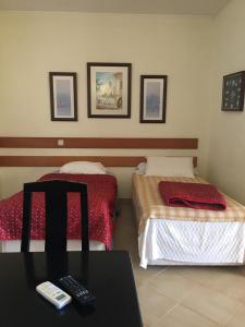 Llit o llits en una habitació de Magnolia Mar Apartamentos
