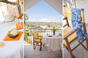 un tavolo e sedie su un balcone con vista di Diano Sporting Apartments a Diano Marina