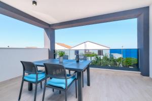 Balkón nebo terasa v ubytování House Torre