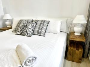 Postel nebo postele na pokoji v ubytování Place De La Mairie